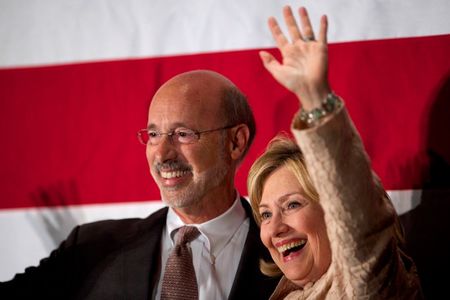 © Reuters. Hillary Clinton waves to the crowd while being introduced by democratic challenger for Pennsylvania Governor Tom Wolf at a "Women for Wolf" grassroots rally in Philadelphia