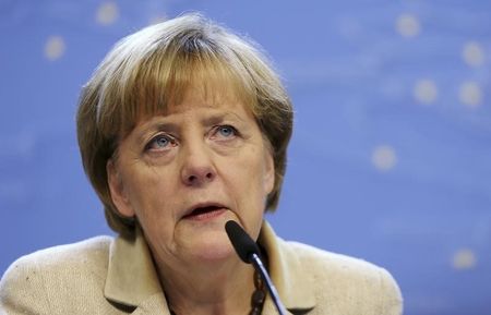 © Reuters. Germany's Chancellor Merkel addresses a news conference after an EU leaders summit in Brussels