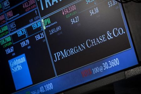 © Reuters. A screen displays JP Morgan Chase & Co. at the post that the stock is traded at on the floor of the New York Stock Exchange