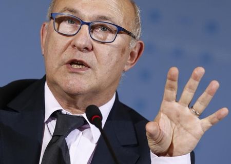 © Reuters. French Finance Minister Sapin addresses news conference at the finance ministry in Berlin