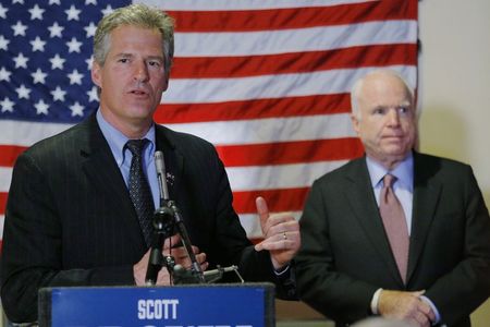 © Reuters. Republican candidate for the United States Senate Scott Brown is joined by U.S. Senator John McCain at a campaign stop at the American Legion Post #3 in Nashua