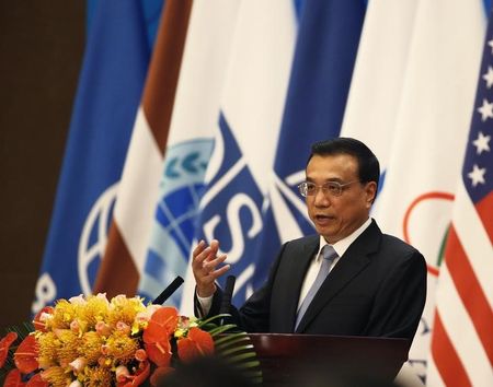 © Reuters. Chinese Premier Li delivers his speech on stage at the opening ceremony of the 4th Ministerial Conference of Istanbul Process of Afghanistan in Beijing