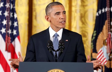 © Reuters. US President Obama answers questions at news conference at White House after mid term elections