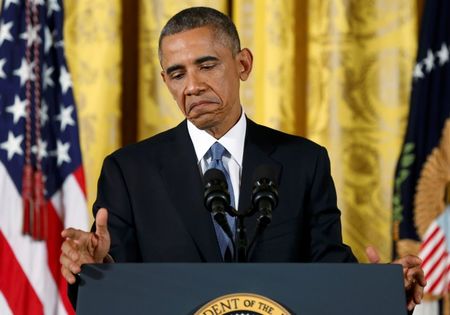 © Reuters. U.S. President Obama gestures during a news conference in the East Room of the White House in Washington