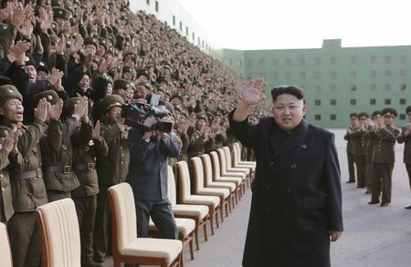 © Reuters. North Korea's leader Kim attends a photo session with the participants of a meeting of KPA battalion commanders and political instructors in this undated photo released by KCNA in Pyongyang