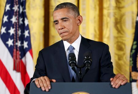 © Reuters. US President Obama answers questions at news conference at White House after mid term elections