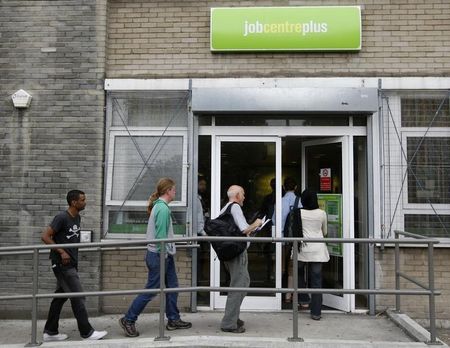 © Reuters. People enter a job centre in London