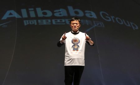 © Reuters. Alibaba Group Executive Chairman Ma gestures as he gives a speech at a staff meeting ahead of the annual 