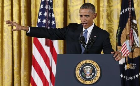 © Reuters. U.S. President Obama answers questions during news conference in the East Room of the White House in Washington