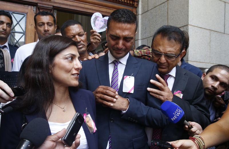 © Reuters. Ami Denborg, sister of Anni Dewani, speaks to journalists as she leaves a court with family members in Cape Town