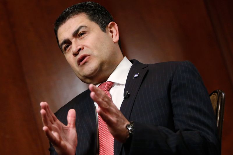 © Reuters. Honduran President Hernandez sits for an interview at his hotel in Washington