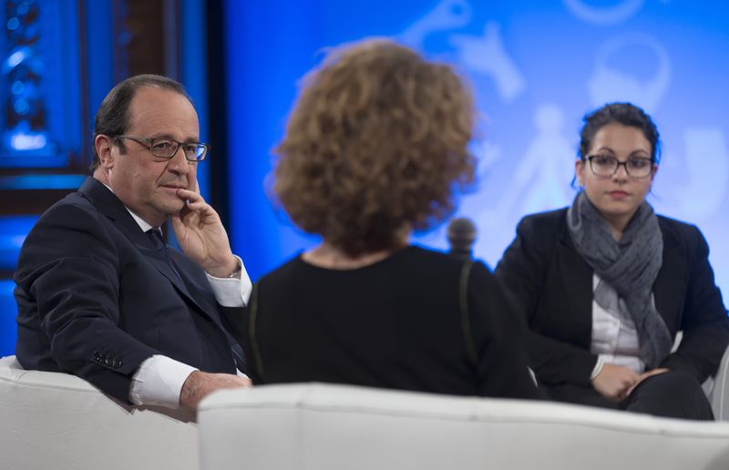 © Reuters. FRANÇOIS HOLLANDE ANNONCE DES MOYENS SUPPLÉMENTAIRES POUR LA SCOLARISATION DES ENFANTS HANDICAPÉS