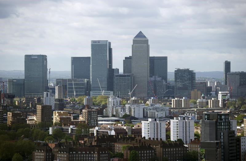 © Reuters. The Canary Wharf financial district is seen from the top of the ArcelorMittal Orbit in the London 2012 Olympic Park in east London