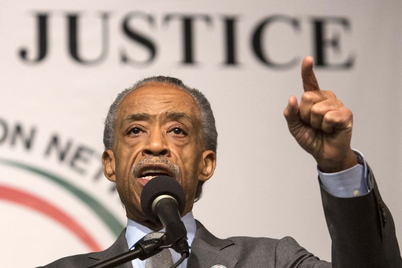 © Reuters. Reverend Al Sharpton announces a march against police violence on December 13 in Washington DC at Reverend Sharpton's National Action Network House of Justice in New York