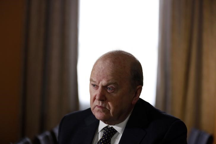 © Reuters. Ireland's Finance Minister Noonan attends an interview with Reuters at his office in central Dublin