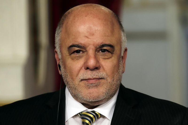 © Reuters. Iraqi Prime Minister Haider al-Abadi attends a news conference at the Elysee Palace in Paris