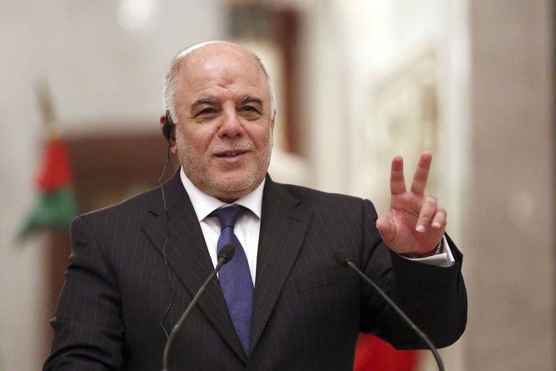 © Reuters. رئيس الوزراء العراقي يكافح لتوحيد أمة ممزقة