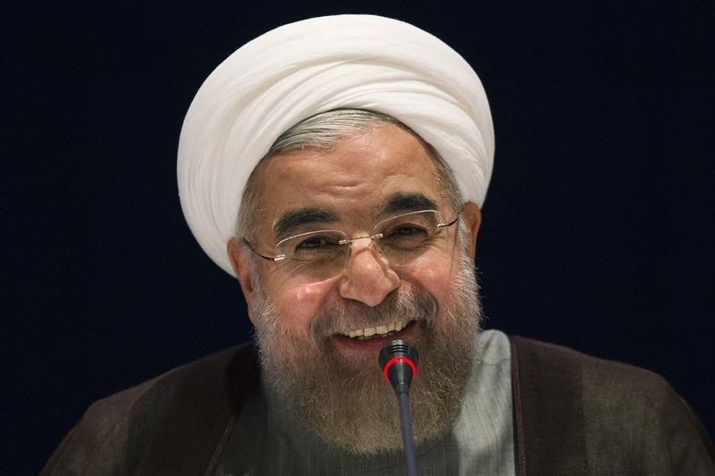 © Reuters. Iran's President Hassan Rouhani smiles while replying to a question during a news conference on the sidelines of the 69th United Nations General Assembly at United Nations Headquarters in New York
