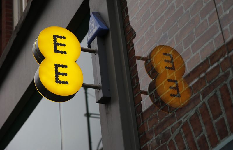 © Reuters. A sign is seen outside an EE shop on Oxford Street in London