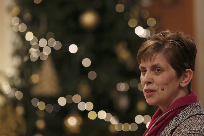 © Reuters. Libby Lane, a suffragan (Assistant) bishop in the Diocese of Chester, listens as her forthcoming appointment as the new Bishop of Stockport is announced in the Town Hall in Stockport