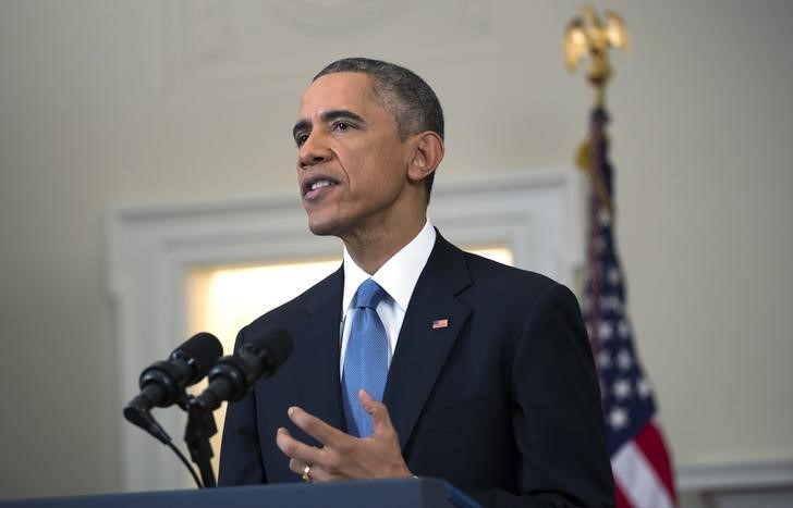 © Reuters. اوباما يعلن أن امريكا ستعيد العلاقات مع كوبا