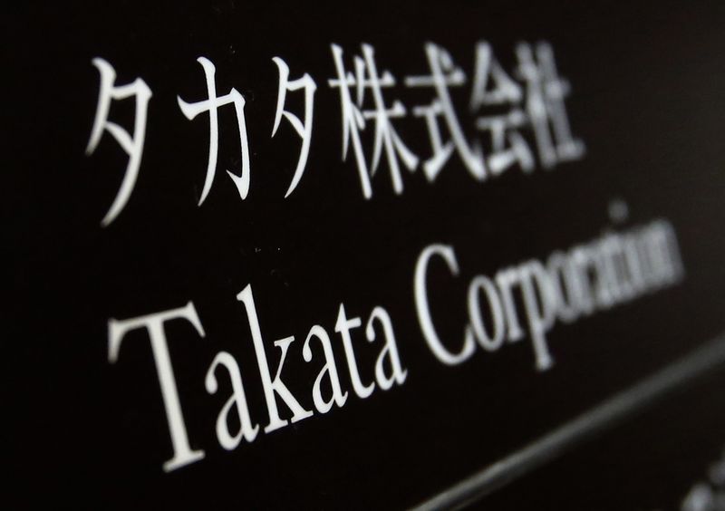 © Reuters. Takata Corp's company plate is seen at an entrance of the building where the Takata Corp headquarters is located in Tokyo