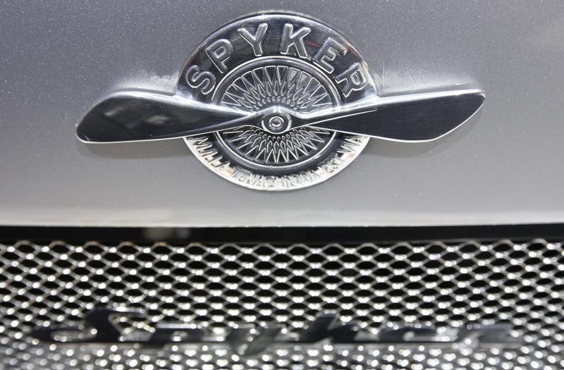 © Reuters. The logo of Dutch car manufacturer Spyker is placed on the bonnet of a Spyker C8 Aileron Spyder car during the first media day of the 80th Geneva Car Show at the Palexpo in Geneva