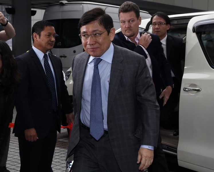 © Reuters. Raymond Kwok, co-chairman of Sun Hung Kai Properties, arrives at High Court in Hong Kong