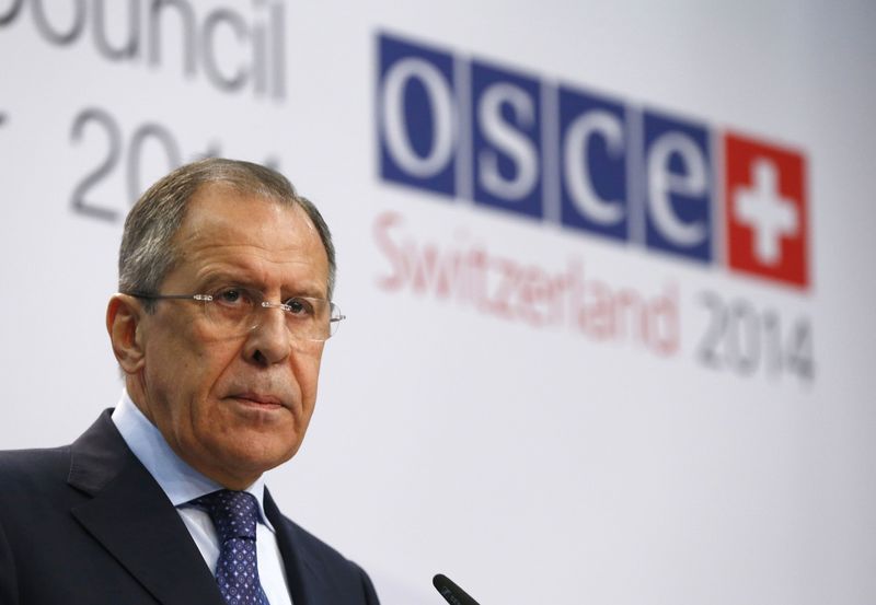 © Reuters. Russia's FM Lavrov speaks to media in a news conference during the OSCE meeting  in Basel