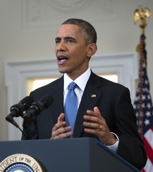 © Reuters. أوباما يوقع على ميزانية للدفاع حجمها 578 مليار دولار للسنة المالية 2015