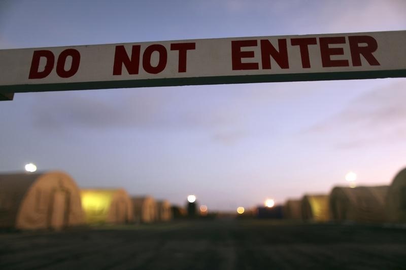 © Reuters. A sign marks a closed-off area at Camp Justice the location of the U.S. Military Commissions court for war crimes, at the U.S. Naval Base in Guantanamo Bay Cuba