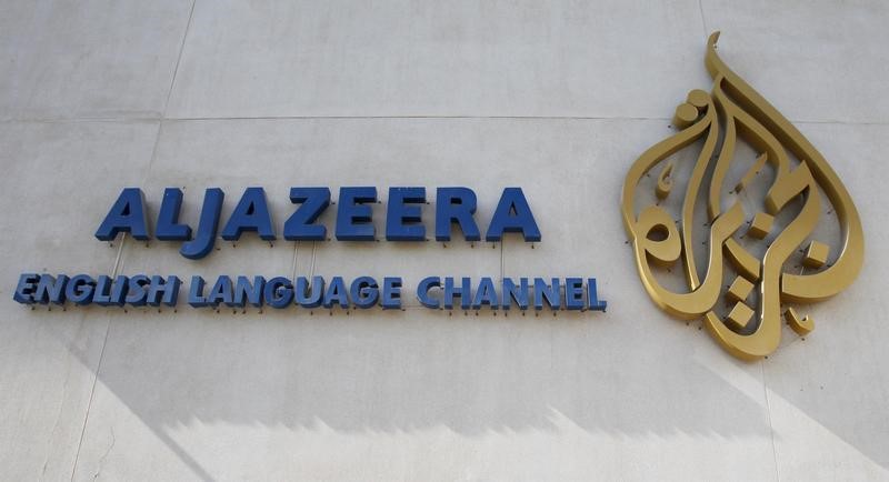 © Reuters. The logo of Qatar-based Al Jazeera satellite news channel is seen in Doha