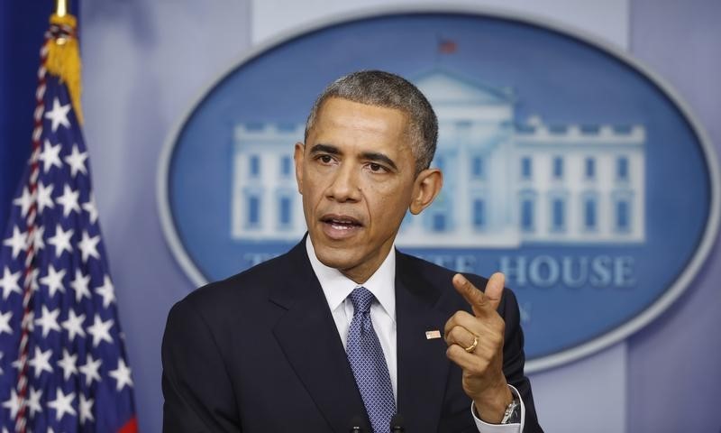 © Reuters. U.S. President Obama answers a question after his end of the year press conference in the briefing room of the White House in Washington