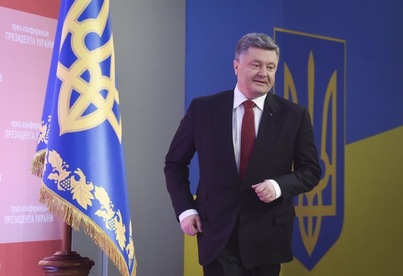 © Reuters. Poroshenko se reunirá con Putin, Merkel y Hollande el 15 de enero