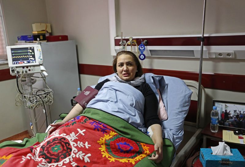 © Reuters. Barakzai speaks during an interview at a hospitalafter having survived an attack on November, in Kabul