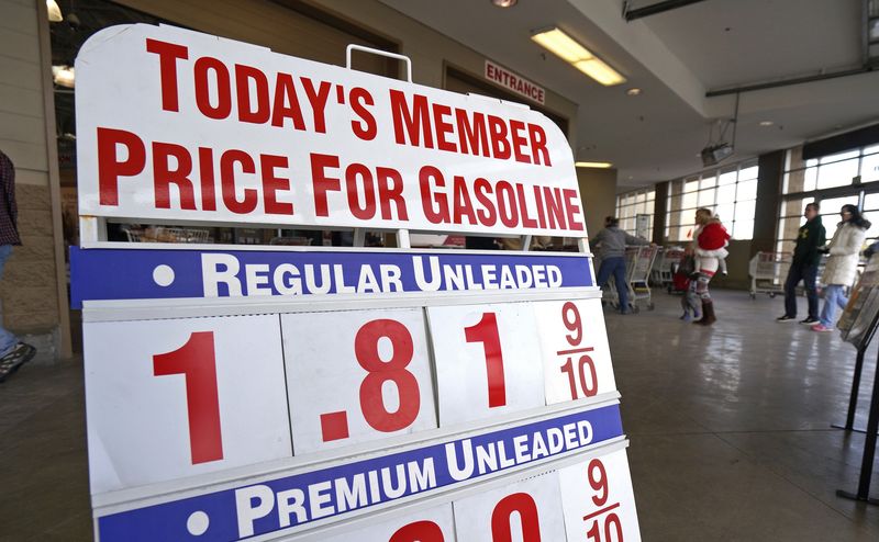 © Reuters. The price sign outside Costco in Westminster, Colorado, shows gas selling for $1.81.9 for the first time in years