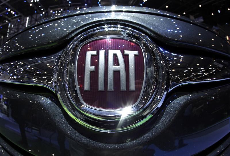 © Reuters. File photo shows the Fiat logo in a car displayed on the Fiat booth during the first media day of the Geneva Auto Show at the Palexpo in Geneva