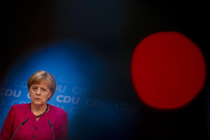 © Reuters. German Chancellor and CDU head Merkel  speaks at news conference after Sunday's Saxony local election in Berlin