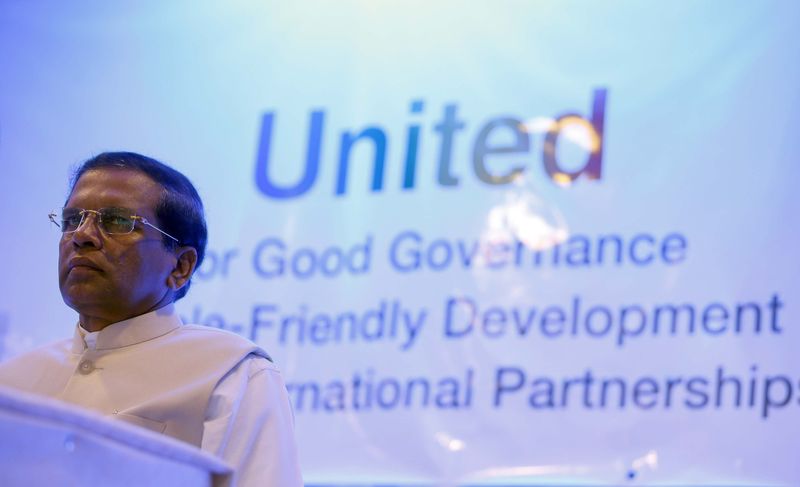 © Reuters. Sri Lanka's common presidential candidate Mithripala Sirisena looks on during a meeting with the Diplomatic Community in Colombo