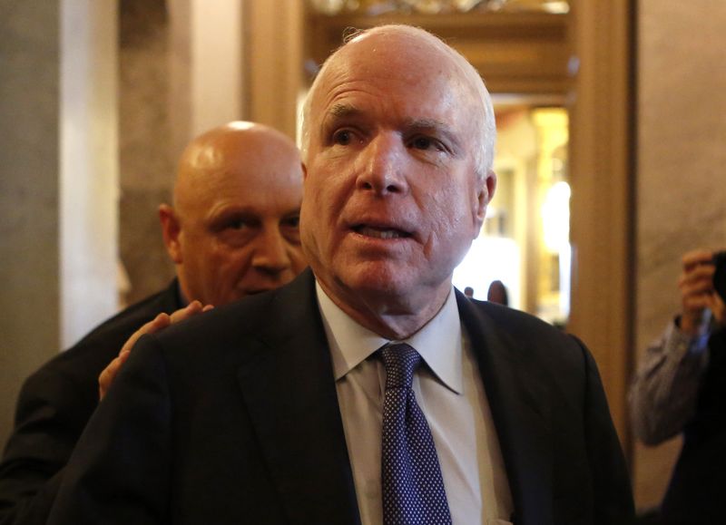 © Reuters. U.S. Senator John McCain (R-AZ) leaves after Senator Dianne Feinstein's (D-CA) speech on the Senate floor on Capitol Hill, in Washington
