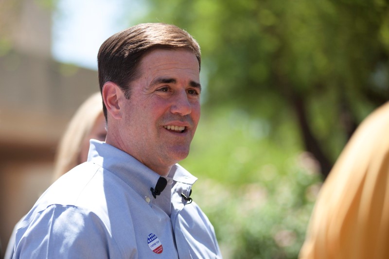 © Reuters. Ducey smiles after voting in Paradise Valley, Phoenix