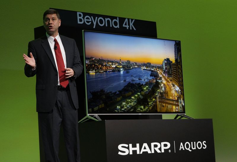 © Reuters. President of Sharp Electronics Marketing Corporation of America Electronics unveils the new Sharp Aquos Beyond 4K TV at the Sharp press conference at the International CES in Las Vegas
