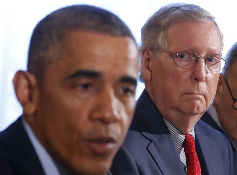 © Reuters. Senate Minority Leader McConnell listens as U.S. President Obama hosts a luncheon for bi-partisan Congressional leaders in the Old Family Dining Room at the White House in Washington