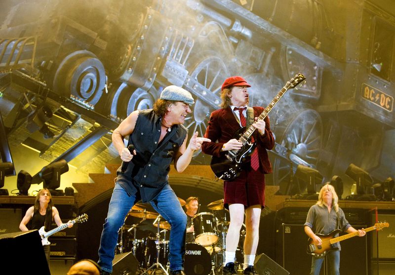 © Reuters. Rock band AC/DC lead guitarist Angus Young and vocalist Brian Johnson perform during a concert at the Telenor Arena in Fornebu