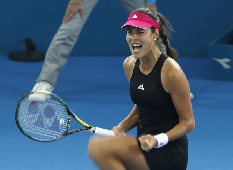 © Reuters. Ana Ivanovic reacts after winning a point against Varvara Lepchenko during their women's singles semi final match at the Brisbane International tennis tournament