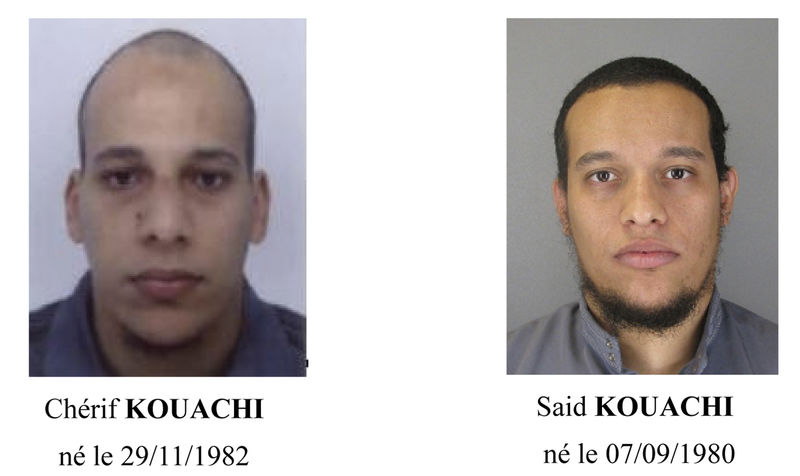 © Reuters. A call for witnesses released by the Paris Prefecture de Police  shows the photos of two brothers who are actively being sought for questioning in the shooting at the Paris offices