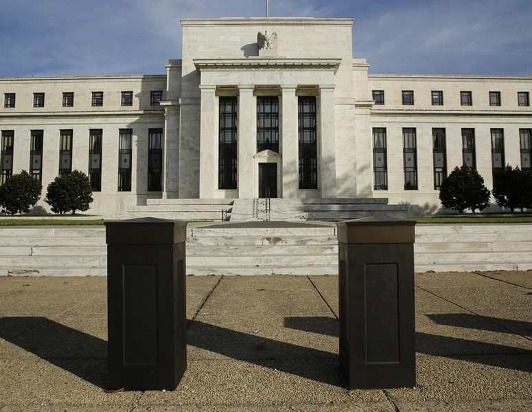 © Reuters. The United States Federal Reserve Board building is shown behind security barriers in Washington