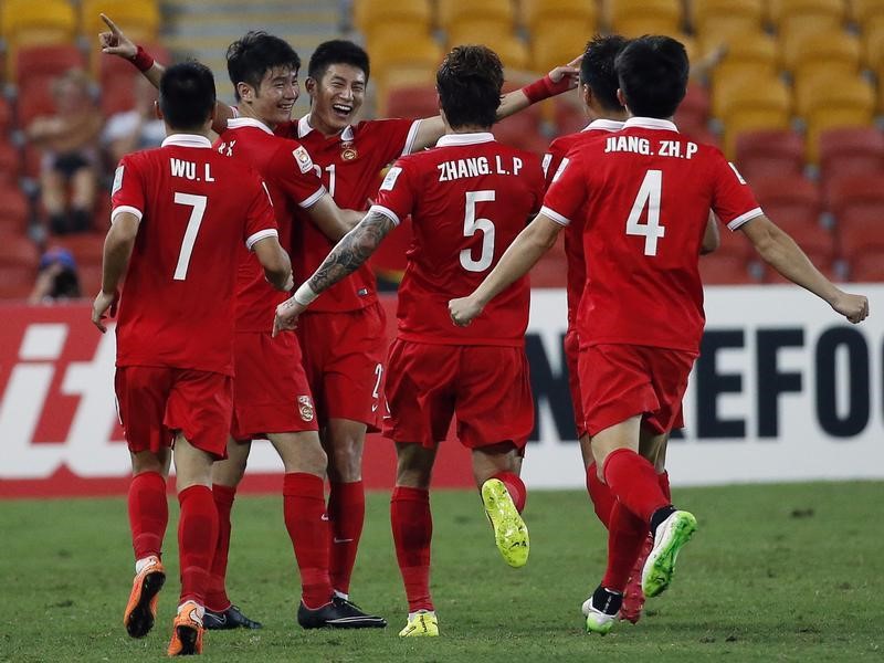 © Reuters. الصين تفاجيء السعودية البطلة السابقة في كأس آسيا