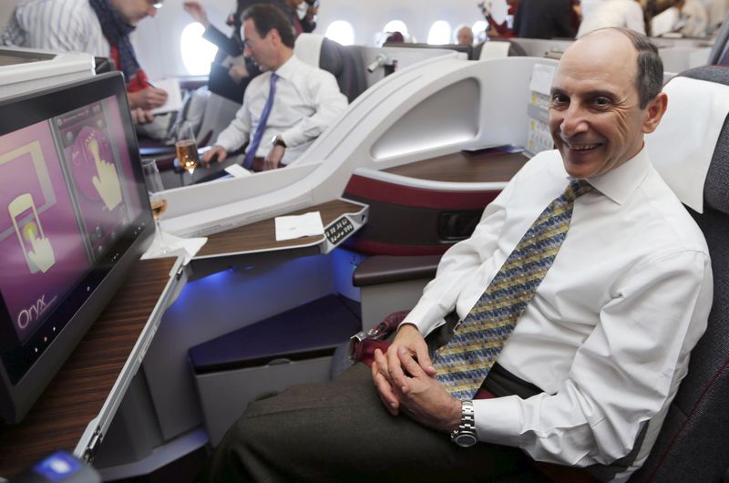 © Reuters. Akbar Al Baker CEO of Qatar Airways Group, smiles as he poses during the flight of the first delivery of the new Airbus passenger jet to Qatar Airways in Toulouse