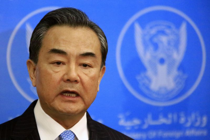 © Reuters. China's Foreign Minister Wang speaks during a news conference with Sudan's Foreign Minister Karti in Khartoum